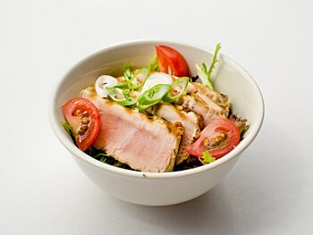 Seared Tuna on a Bed of Mixed Leaves with Spring Onion and Baby Tomatoes