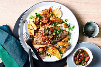 Pan Roasted Sea Bass with Cherry Tomatoes, Capers on a Beurre Blanc Sauce & Roasted Potatoes