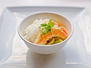 Thai Green King Prawn Curry on a bed of fragrant Rice with Coriander