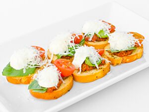 Mozarella with Sun Blush Tomato on Crostini